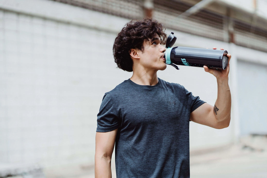 Man drinking O.R.S Hydration GLP-1 electrolytes