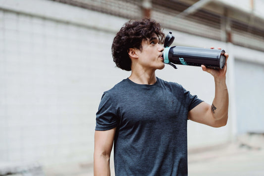 Man drinking O.R.S Hydration GLP-1 electrolytes