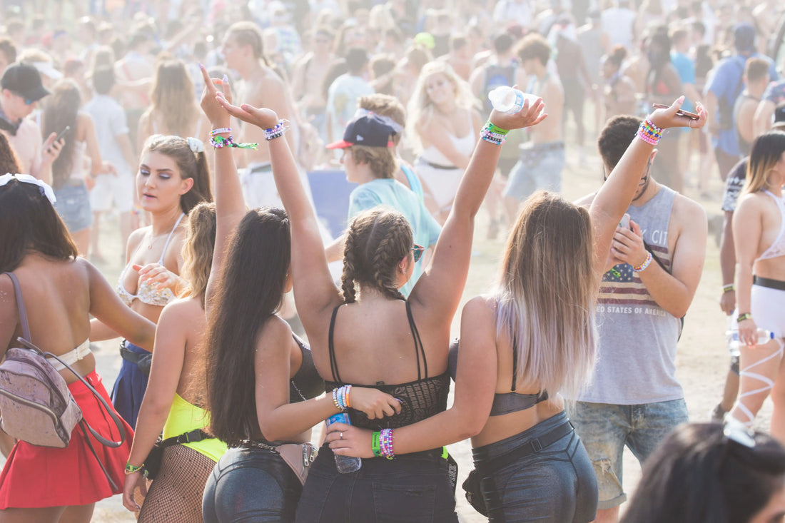 A crowd of young people at a festival
